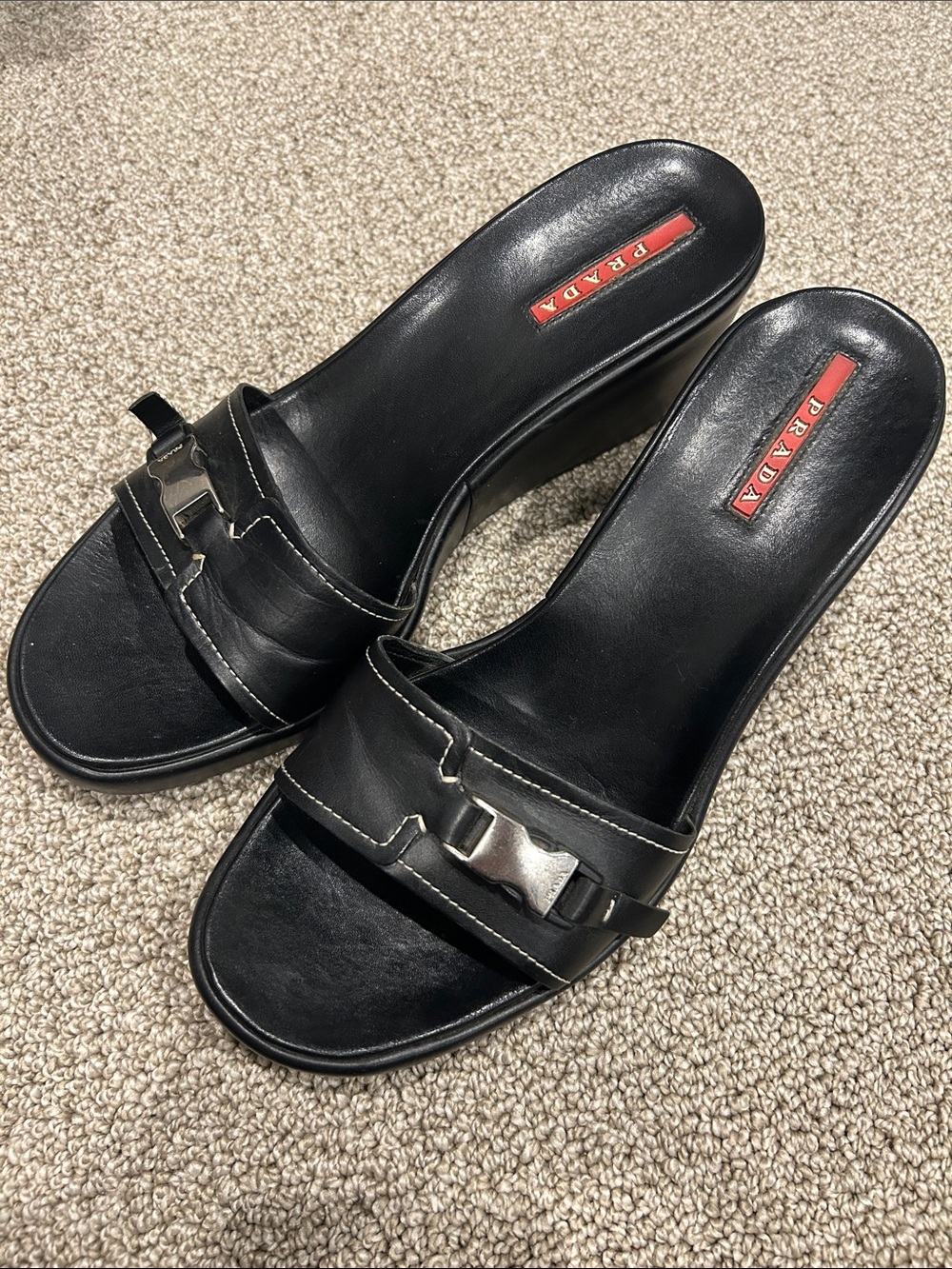 Prada Black Leather Slide Mules with Silver Buckle